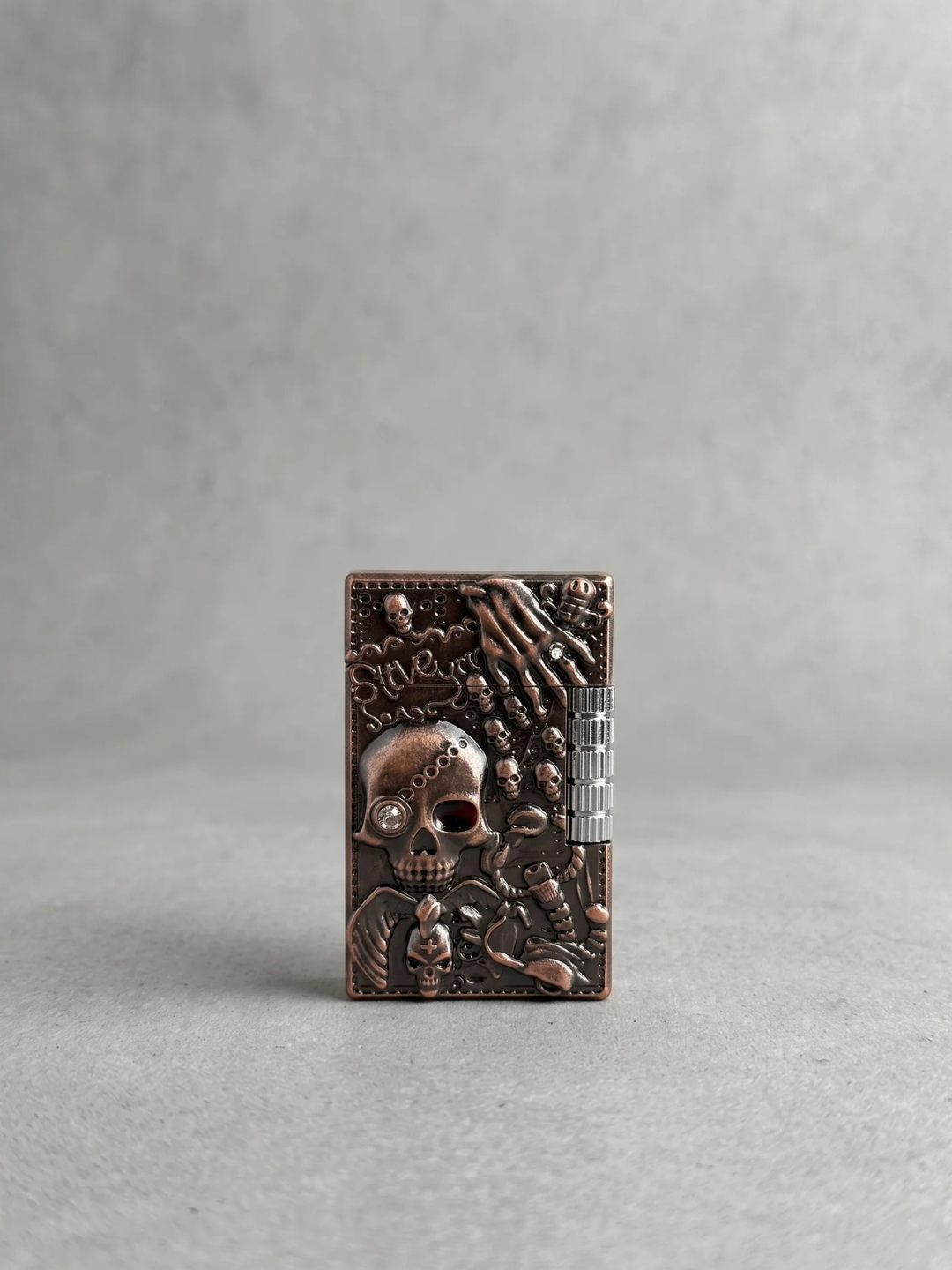 Vintage Skull & Skeleton Embossed Metal Lighter