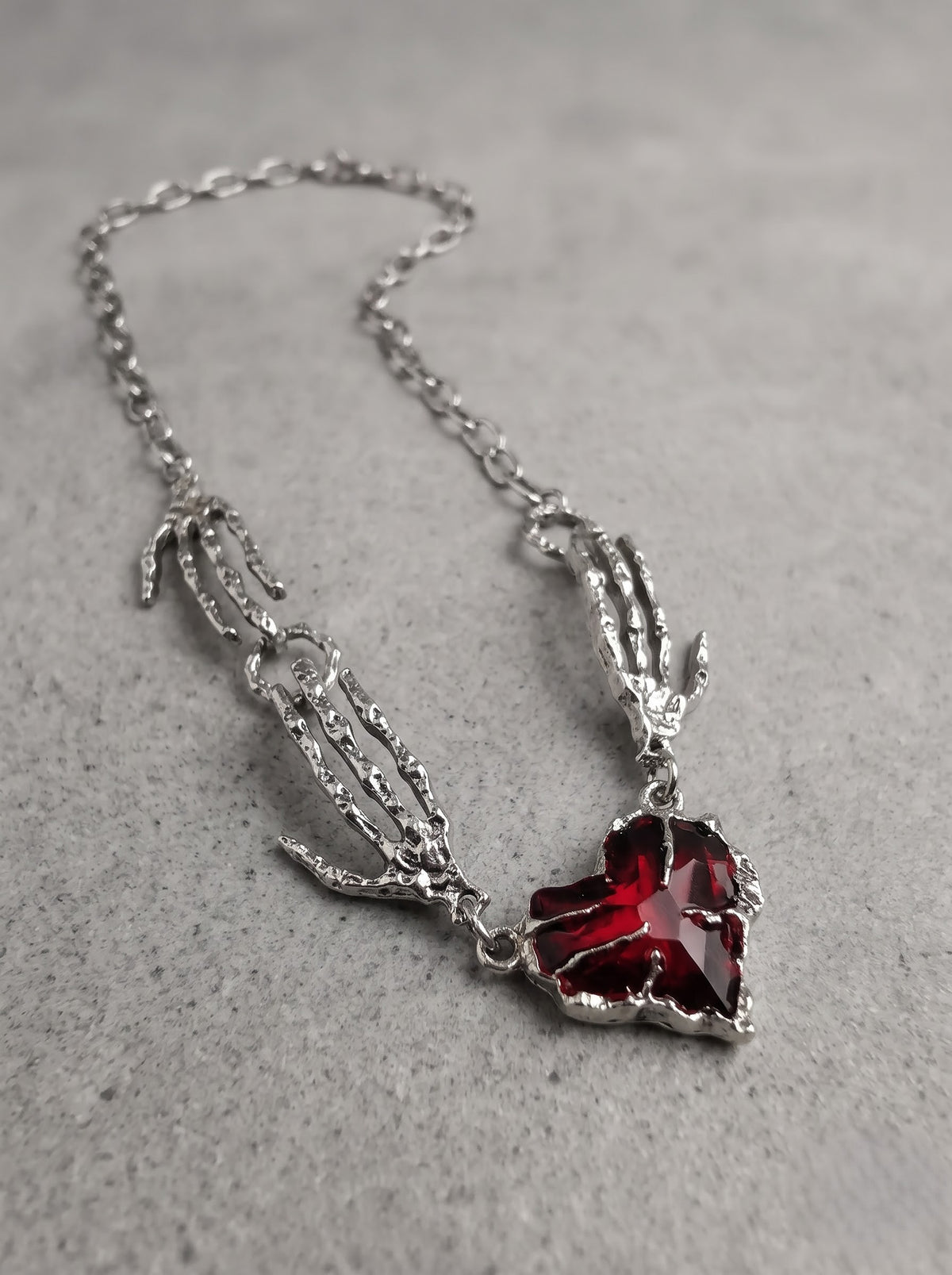 Crimson Heart Skeleton Hand Necklace