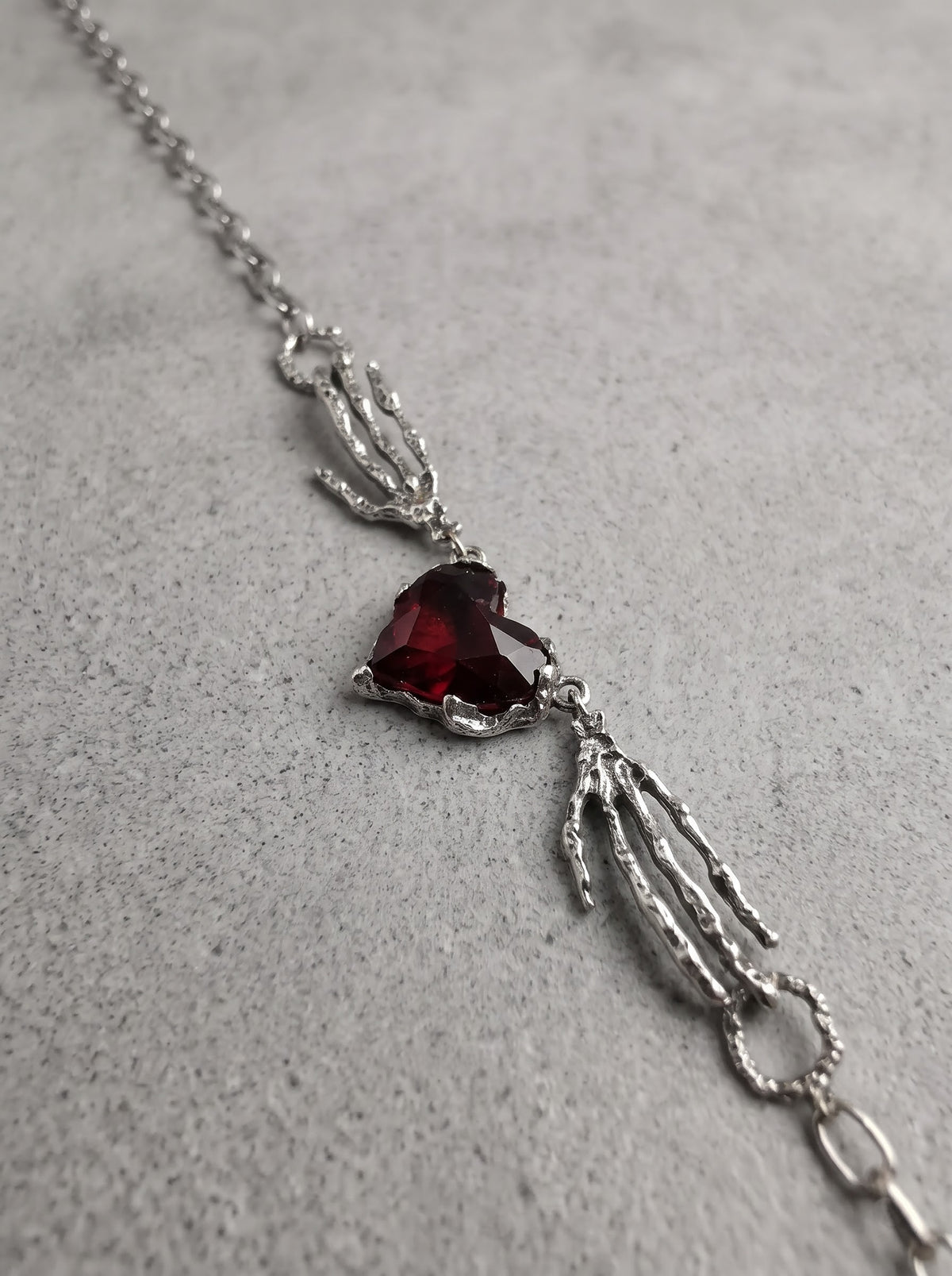 Crimson Heart Skeleton Hand Necklace